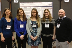 Professors Borton and Oakes with Ellen Doernberg '13, Ashley Sutton '13, and Arielle Berti '13 at the Society for Personality and Social Psychology meeting in New Orleans, 2013 